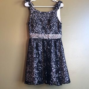 Black lace, fit and flare dress (juniors)